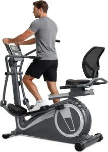 THERUN recumbent elliptical machine, rear three-quarter view of a man standing and using the pedals and handlebars