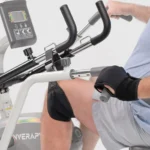 Close-up of the Innova RCT2025 console, suspension handlebars, and leg harness with wrist strap