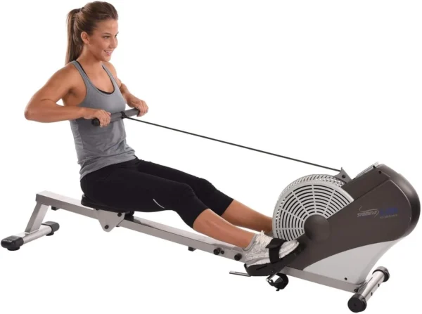 Stamina ATS Air Rower, studio hero shot with woman rowing