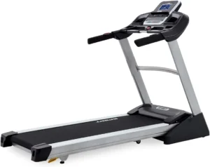 Spirit Fitness XT385 treadmill, three-quarter studio hero shot