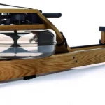 B00KXD5HPC rowing machine - three-quarter angle showing tank and wood grain