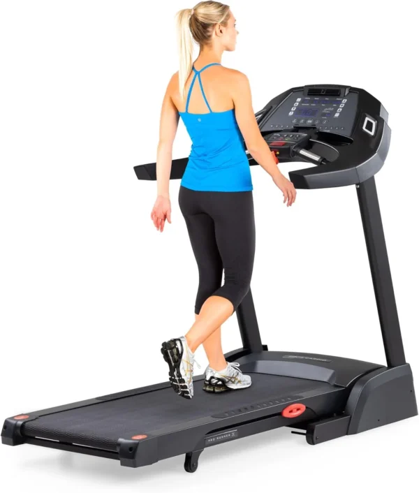 3G Cardio Pro Runner X treadmill, woman running, rear three-quarter studio view showing console