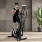 Man using the Keiser M5i Strider elliptical