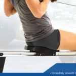Close-up of a woman on the XTERRA ERG200 full-length aluminum slide rail