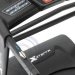Close-up of the XTERRA TR65 Sport Series treadmill incline control panel and hand pulse sensor grip