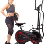 Woman standing beside the Body Power Trio Trainer, showing the adjustable seat back
