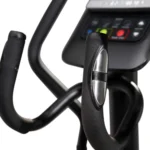 Schwinn 411 handlebar grip and resistance adjustment buttons close-up