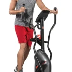 Man using the Schwinn 411 compact elliptical