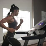 Woman running on the ProForm Pro SpaceSaver treadmill in a home living room, side view
