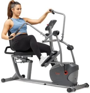 Woman using the Sunny SF-RBE420035 recumbent elliptical cross trainer, side view