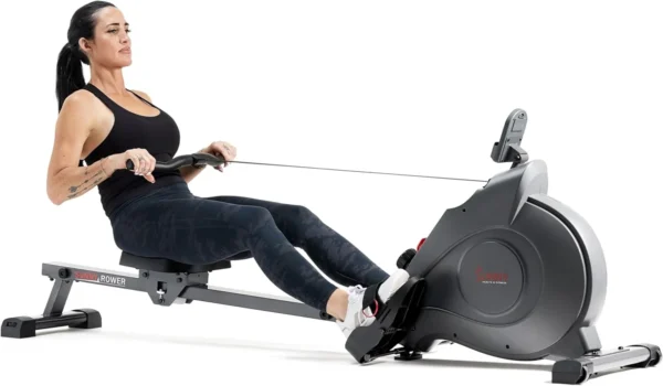 Sunny smart magnetic rower with extra long rail, three quarter studio hero shot with man rowing
