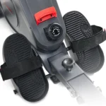 Close-up of the Sunny extra long rail rower 8-level tension control dial and pedals
