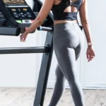 Runner on the Horizon T202 treadmill, rear view mid-stride