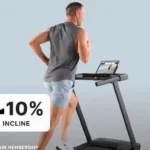 Runner using the NordicTrack T Series T5 treadmill on a 10 percent incline, rear angle