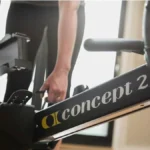 B0CXDD611S rowing machine - footplate and monorail close-up