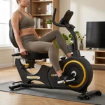 Woman using the VANSWE RB405 recumbent bike in a home living room, close side view
