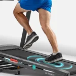 Close-up of feet on Sunny SF-T724012 running belt showing shock absorption