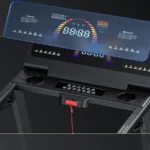 WELLFIT treadmill console close-up showing LED display and 13-button control panel