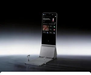 Three-quarter studio shot of the AEKE K1 mirror unfolded with bench lowered and screen lit