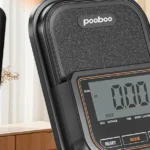 pooboo recumbent bike console close-up showing the multi-function LCD display, tablet holder, and RESET/MODE/SET buttons