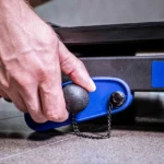 Close-up of the XTERRA TRX1000 manual incline adjustment pin