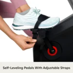 Schwinn 280 Recumbent Bike self-leveling pedal with adjustable strap close-up