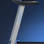 Side profile of the WELLFIT Heavy Duty treadmill's console arm showing the WELLFIT branding