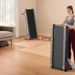 Jogwell 12/20 extra-wide walking pad shown stored vertically and lying flat for space comparison
