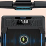 Console close-up on the WELLFIT 400+ lb foldable treadmill showing the WELLFIT display and AI voice control