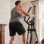 Man using the Niceday elliptical from a rear angle in a living room
