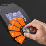 Close-up of the THERUN elliptical console showing the 32-level resistance dial and program icons