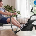 Man using the pooboo rower in dual paddle mode with two separate handles