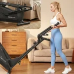 ANCHEER elliptical folded flat and a woman wheeling it across a living room, folded state inset