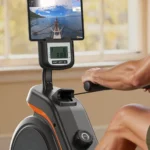 Close-up of the YOSUDA RM-187 rower digital screen and tablet mount in use